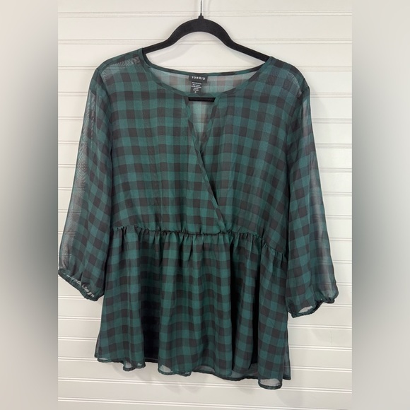 Torrid women’s black & green buffalo print sheer, peplum style blouse. Size 0 - Picture 1 of 6